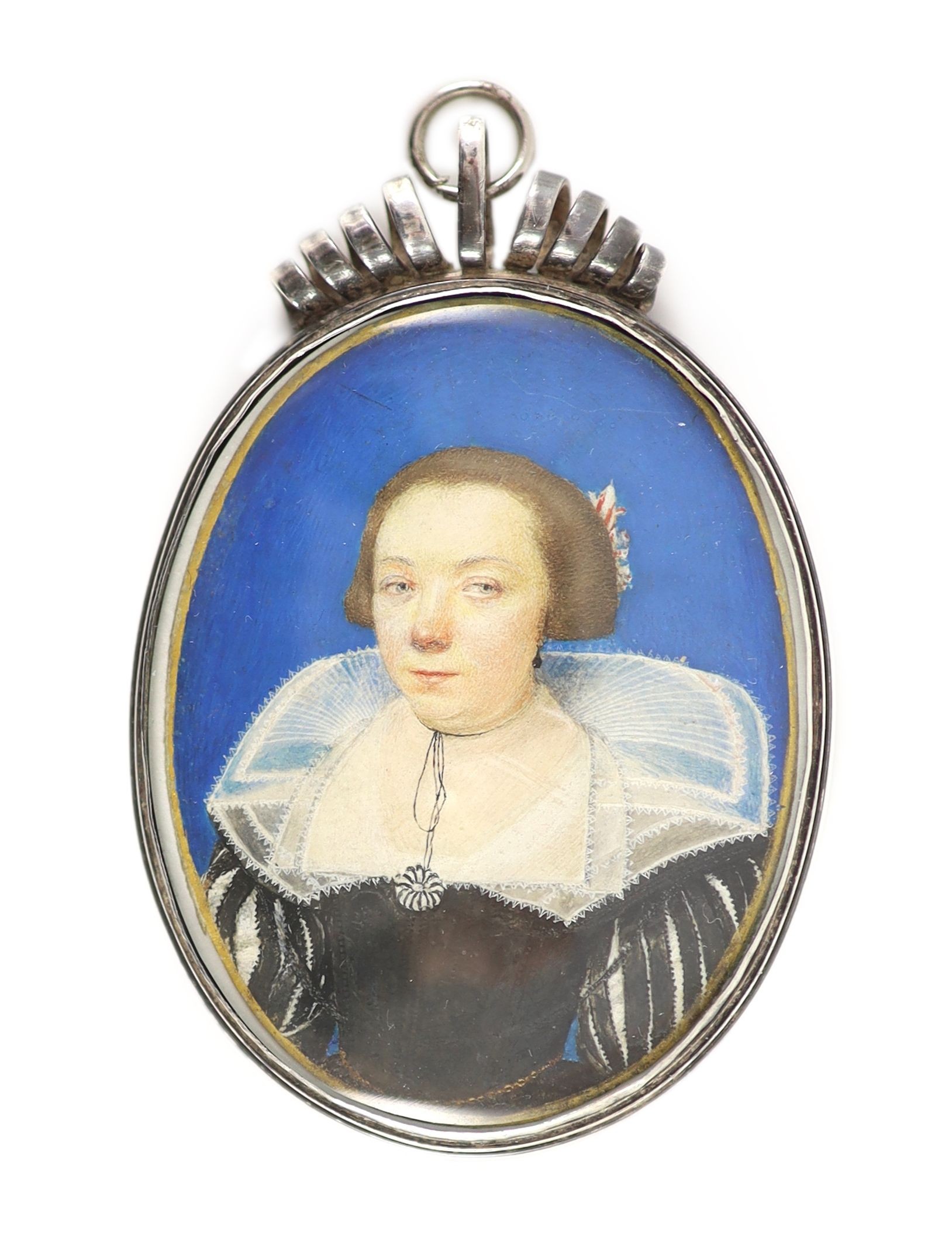 17th century English School , Portrait miniature of a lady wearing a black dress with lace collar and a silver pendant, watercolour on vellum, 5 x 4cm, silver frame